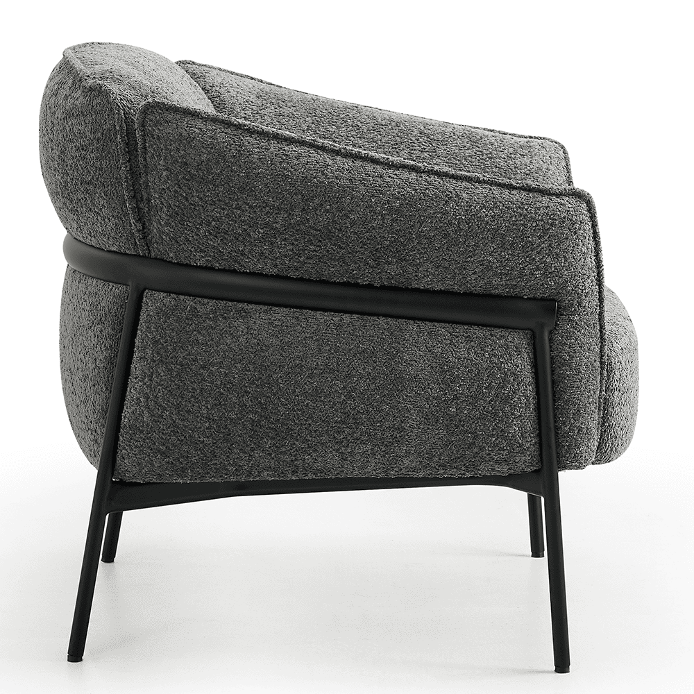 Zijaanzicht van de grijze Nova Flow fauteuil met zwart frame