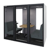 De akoestische werkruimte VOX Pod large in het zwart met een eiken houten tafel en 4 persoonszit
